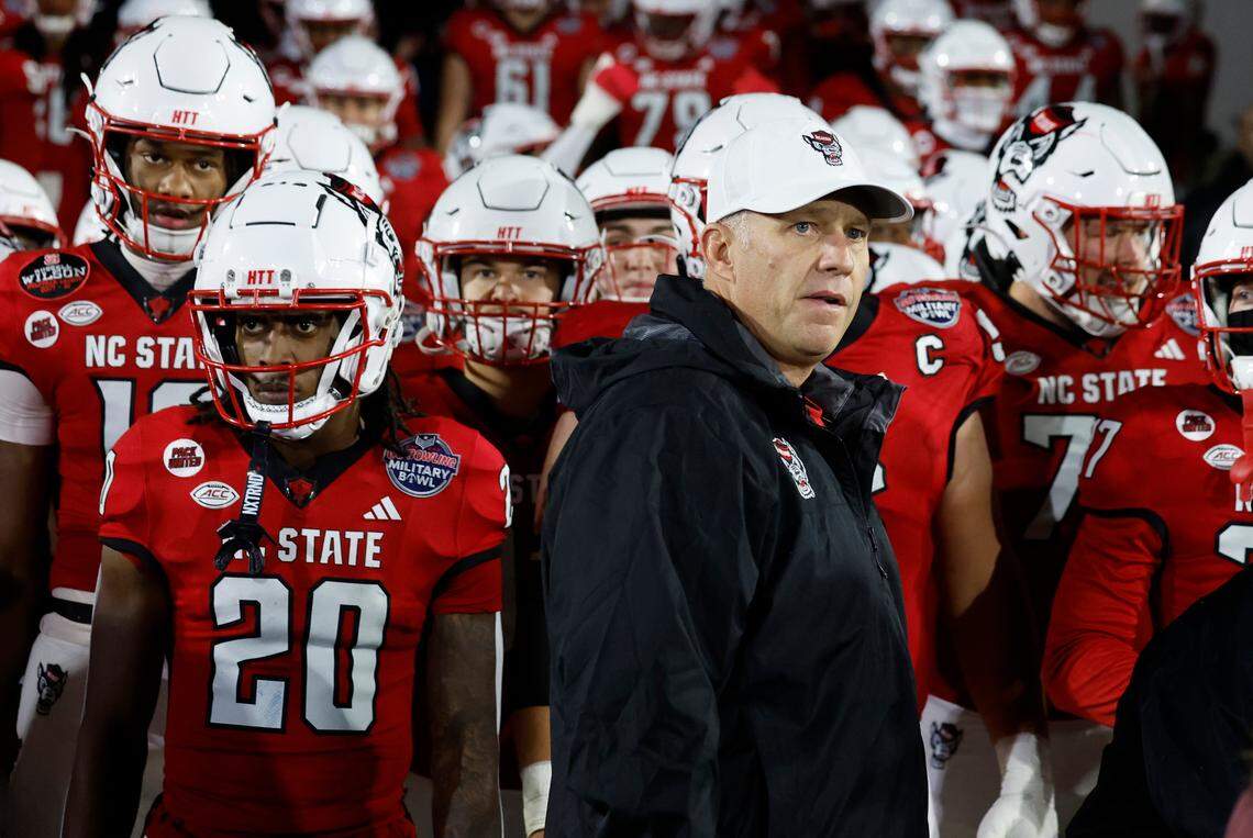 N.C. State head coach Dave Doeren prepares to lead his team onto the field before the Wolfpack’s game against ECU in the Military Bowl at Navy-Marine Corps Memorial Stadium in Annapolis, Md., Saturday, Dec. 28, 2024.