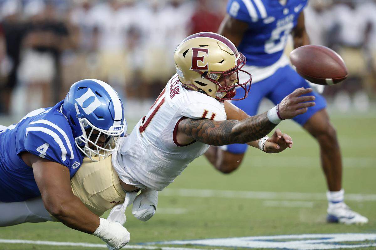 Duke’s Josiah Green tackles Elon quarterback Landen Clark during the first half of the Blue Devils’ season opener on Thursday, Aug. 28, 2025, at Wallace Wade Stadium in Durham, N.C.