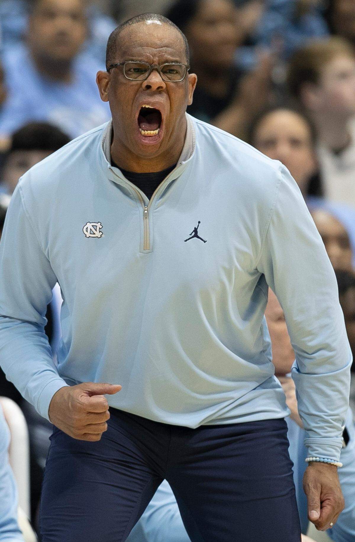 North Carolina coach Hubert Davis directs his team on defense in the first half against Duke on Saturday, March 4, 2023 at the Smith Center in Chapel Hill, N.C.