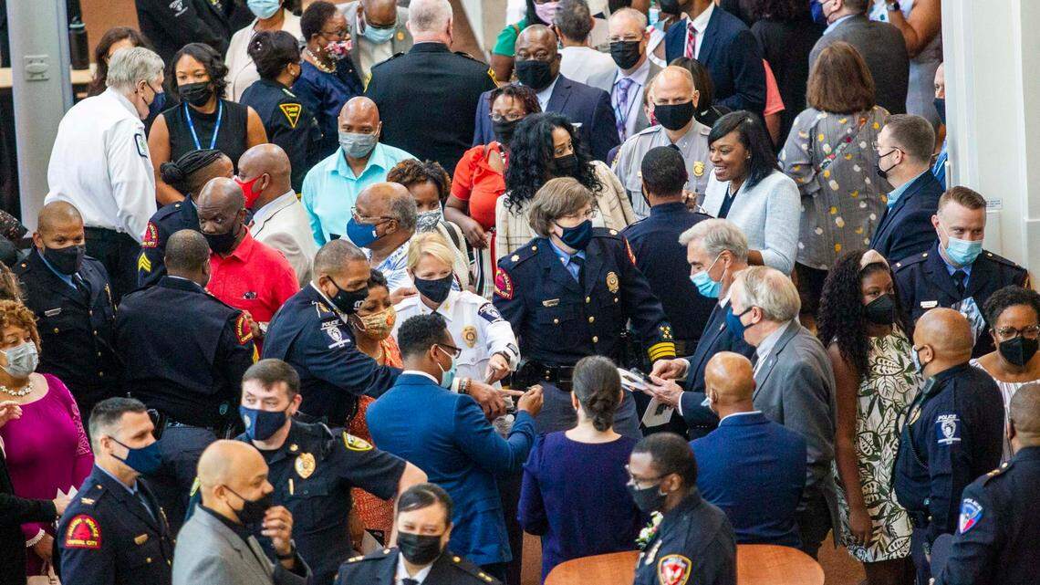 People gather in the lobby of the Duke Energy Center for the Performing Arts after a swearing in ceremony for Raleigh Chief of Police Stella Patterson Thursday, Aug. 12, 2021. The city of Raleigh will require people to wear masks, regardless of vaccination status, in indoor public spaces and businesses starting at 5 p.m. Friday.