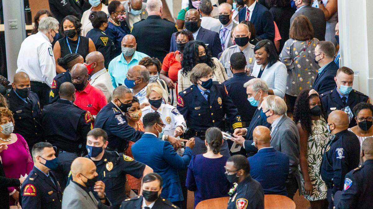 People gather in the lobby of the Duke Energy Center for the Performing Arts after a swearing in ceremony for Raleigh Chief of Police Stella Patterson Thursday, Aug. 12, 2021. The city of Raleigh will require people to wear masks, regardless of vaccination status, in indoor public spaces and businesses starting at 5 p.m. Friday.