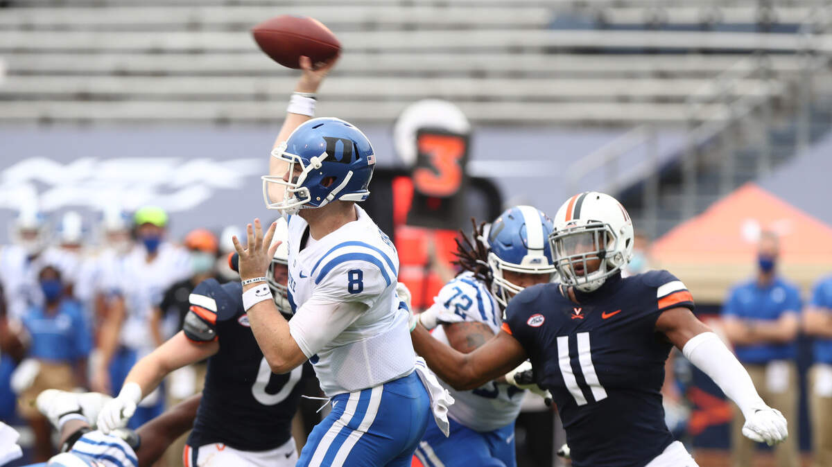Duke Blue Devils quarterback Chase Brice (8) throws the ball during first half action against Virginia Saturday at Scott Stadium.