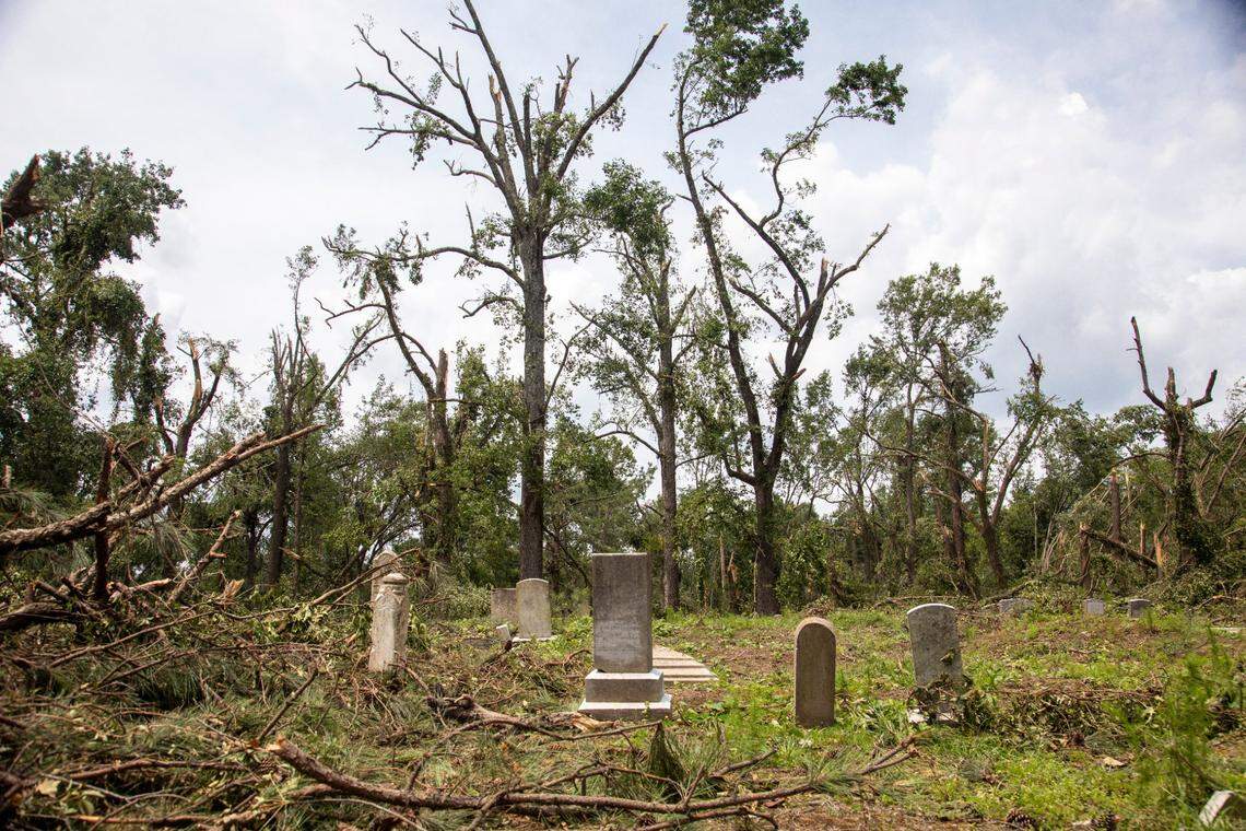 Downed trees and limbs lay in the path of a tornado in a cemetery near Rocky Mount Thursday, July 20, 2023. An EF3, tornado with wind speeds of 150 mph touched down in Nash County Wednesday around 12:30 p.m. Wednesday according to the Raleigh National Weather Service.