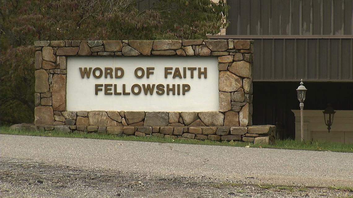 This 2016 image from video shows the entrance to the Word of Faith Fellowship church in Spindale, N.C. A member of the secretive North Carolina church has been sentenced to 10 months of home confinement for taking part in an unemployment fraud scheme benefiting businesses with ties to the congregation. Diane McKinny also received three years of probation at the federal court hearing Thursday, Sept. 26, 2019. She pleaded guilty in May to making a fraudulent claim for unemployment benefits for workers at a company run by a minister at Word of Faith Fellowship in Spindale.