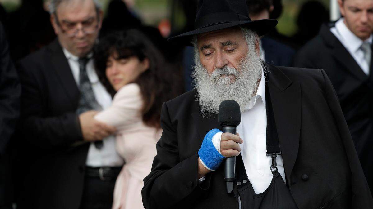 Rabbi Yisroel Goldstein speaks during funeral services for shooting victim Lori Kaye, who was killed last month when a man opened fire two days earlier near San Diego.