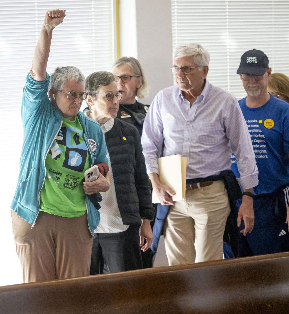Demonstrators are removed from the gallery of the N.C. House as they denounce Senate Bill 249, a bill to realign the North Carolina Congressional districts, on Wednesday, October 22, 2025 at the General Assembly in Raleigh, N.C. 
