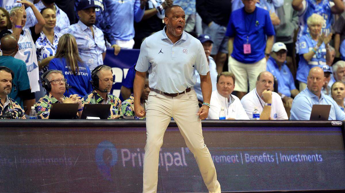 North Carolina Tar Heels head coach Hubert Davis reacts to a call during the second half against the Auburn Tigers at Lahaina Civic Center.