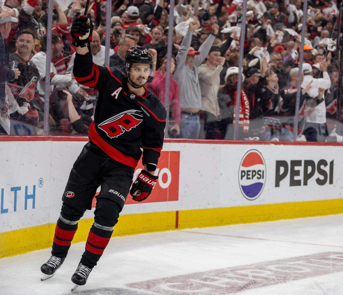 Carolina Hurricanes center Sebastian Aho (20) reacts after scoring on Florida Panthers goalie Sergei Bobrovsky (72) to take a 2-0 lead in the first period during Game 5 to take a 2-0 of their Stanley Cup series on May 28, 2025 at Lenovo Center in Raleigh, N.C.