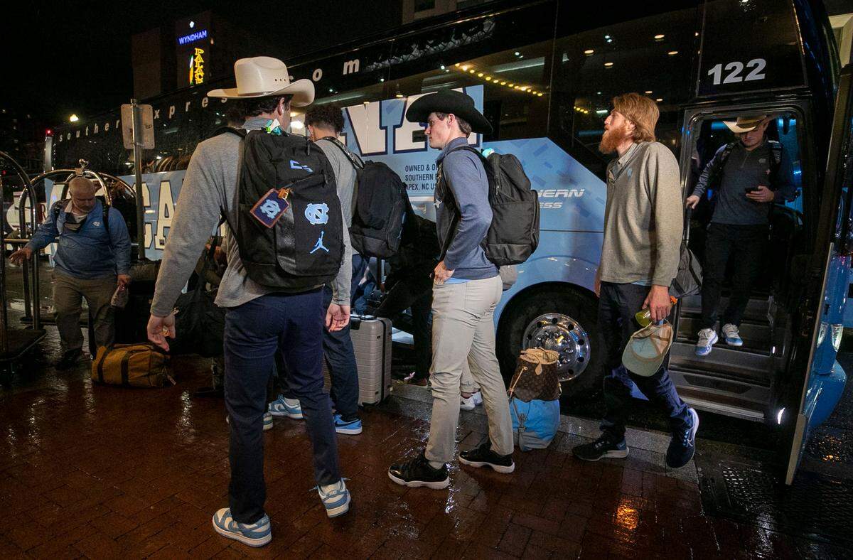 North Carolina’s Brady Manek steps off the team bus as he arrives at the Sheraton Hotel on Canal Street for the NCAA Final Four on Wednesday, March 30, 2022 in New Orleans, La.