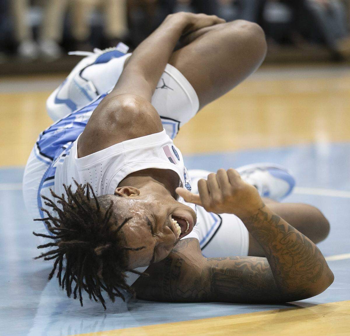 North Carolina’s Armando Bacot (5) goes down with an injury in the first half against Ohio State on Wednesday, December 4, 2019 at the Smith Center in Chapel Hill, N.C.