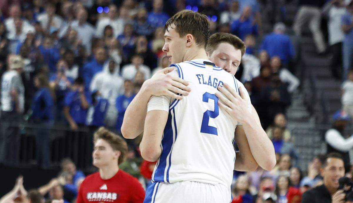 Duke’s Kon Knueppel (7) hugs Cooper Flagg (2) after Knueppel’s last second shot didn’t fall during the second half of Kansas’ 75-72 victory over Duke in the Vegas Showdown at T-Mobile Arena in Las Vegas, Nev., Tuesday, Nov. 26, 2024.