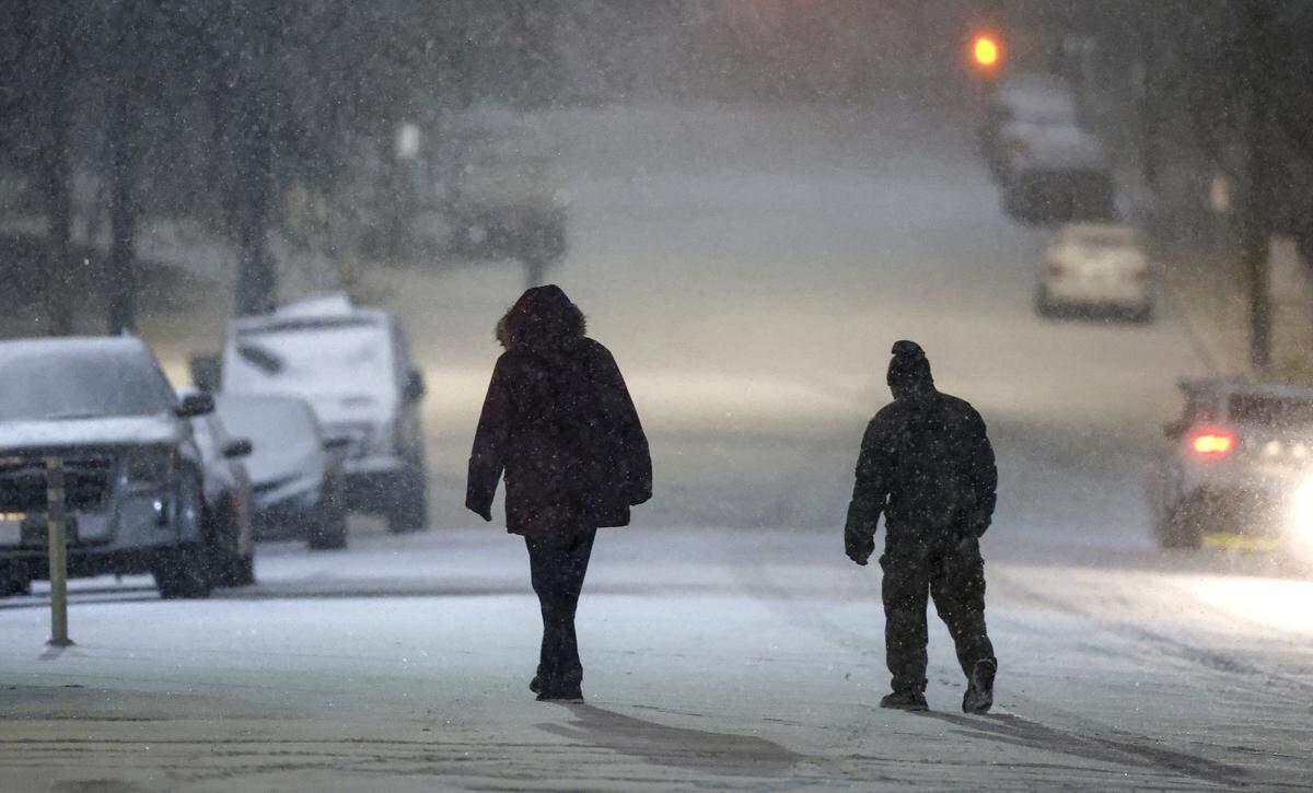 W. North Street in the Glenwood South district in Raleigh is covered in snow Saturday evening, Jan. 31, 2026.