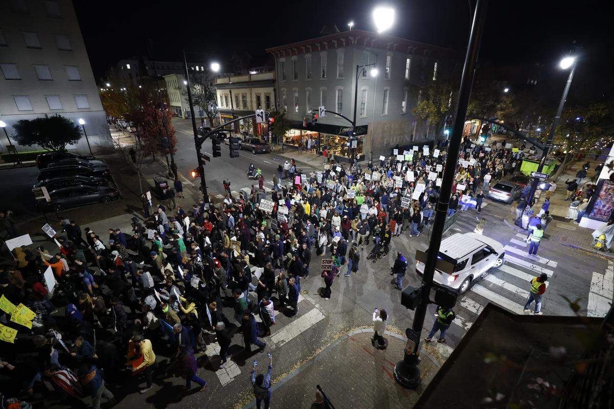 Hundreds march in downtown Raleigh’s Moore Square Tuesday night, Nov. 18, 2025, to protest Border Patrol agents making raids and arrests in the Triangle. Ethan Hyman ehyman@newsobserver.com