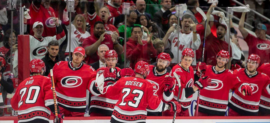 The Carolina Hurricanes Stefan Noesen (23) and Sebastian Aho (20) skate to the bench after a goal by Noesen in the first period against the New York Islanders during Game 5 of their Stanley Cup series on Tuesday, April 25, 2023 at PNC Arena in Raleigh, N.C. The goal was nullified as Noesen was called offsides.