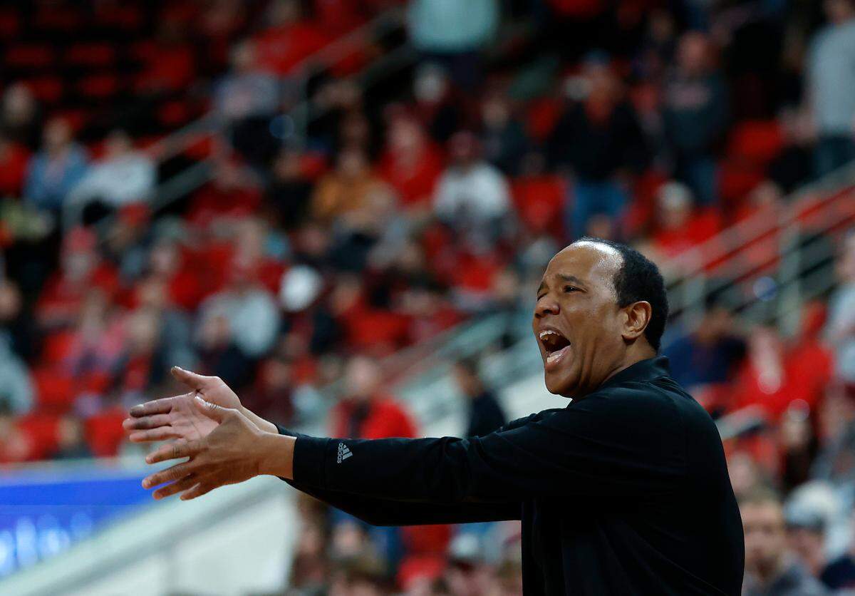 N.C. State head coach Kevin Keatts gives instructions from the sideline during overtime of the Wolfpack’s 84-74 win over Florida State on Saturday, Dec. 7, 2024, at Lenovo Center in Raleigh, N.C.