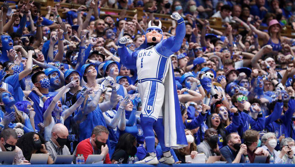 The Duke Blue Devil poses in front of the Cameron Crazies during the Blue Devils’ game against UNC at Cameron Indoor Stadium on March 5.