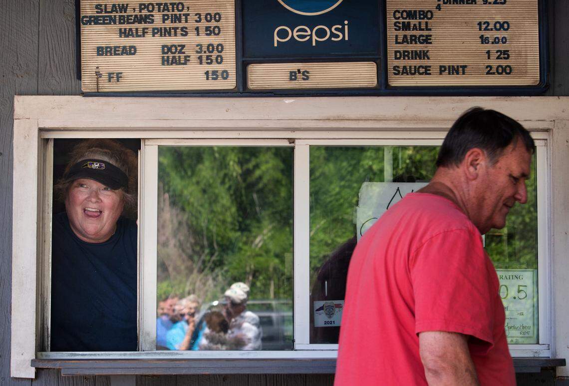 Barbecue is served from a walk-up windows at B’s Barbecue in Greenville. The line forms early, especially on weekends.