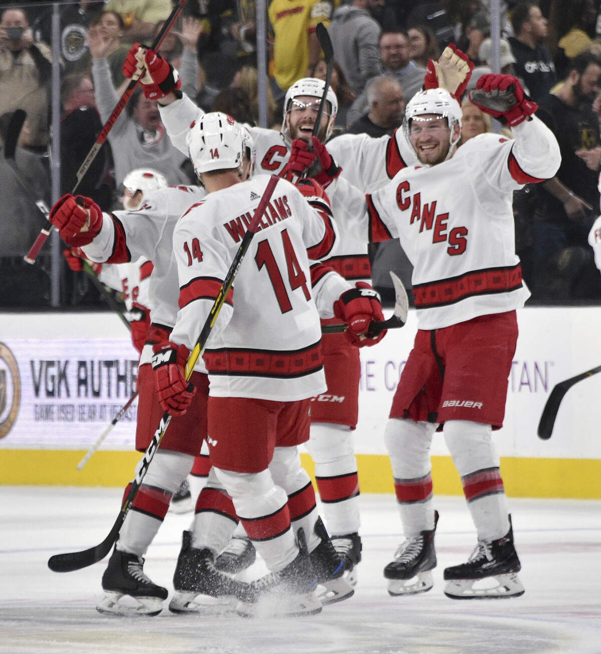 The Carolina Hurricanes celebrate a goal by right wing Justin Williams (14) in the shootout against the Vegas Golden Knights in an NHL hockey game Saturday, Feb. 8, 2020, in Las Vegas. (AP Photo/David Becker)