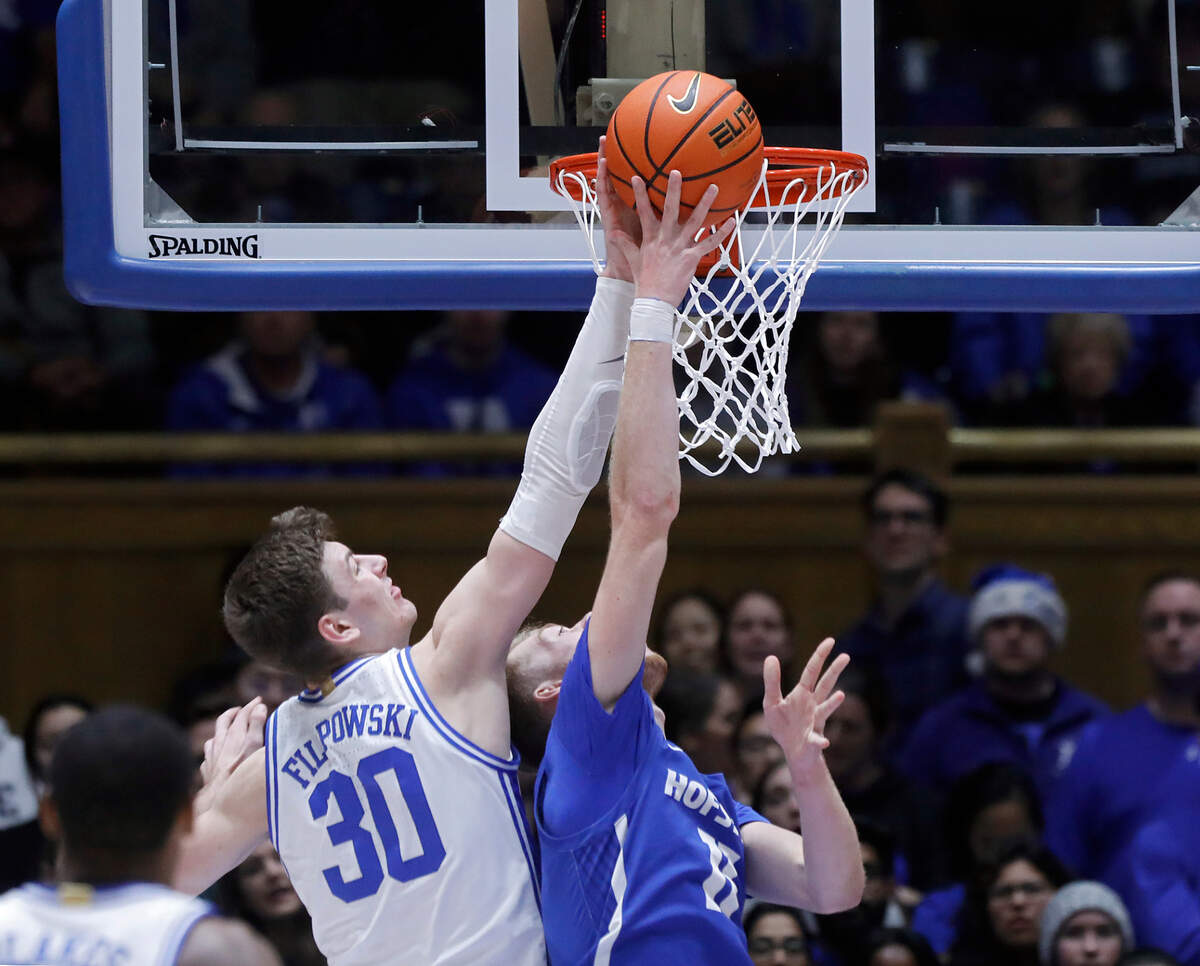 Duke’s Kyle Filipowski blocks a shot by Hofstra’s Jacco Fritz during the first half of the Blue Devils’ 89-68 win on Tuesday, Dec. 12, 2023, at Cameron Indoor Stadium in Durham, N.C.