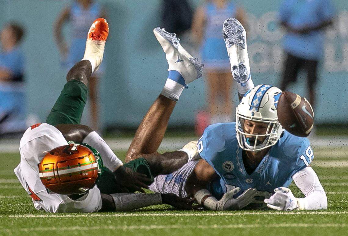 Florida A&Ms KymMani King (4) breaks up a pass intended for North Carolinas Bryson Nesbit (18) in the fourth quarter on Saturday, August 27, 2022 at Kenan Stadium in Chapel Hill, N.C.