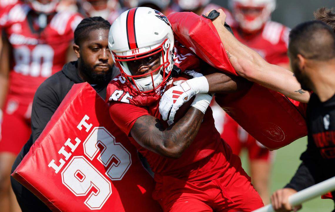 N.C. State wide receiver Tank Boston (85) runs drills during the Wolfpack’s first practice in Raleigh, N.C., Wednesday, July 31, 2024.