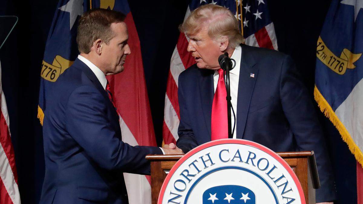 Former President Donald Trump, right, announces his endorsement of N.C. Rep. Ted Budd, left, for the 2022 North Carolina U.S. Senate seat as he speaks at the North Carolina Republican Convention Saturday, June 5, 2021, in Greenville, N.C.