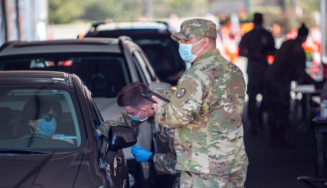 Members of the U.S. Air Force administer vaccinations at a mass vaccination clinic Wednesday, March 10, 2021 at Four Season Town Center in Greensboro. The clinic expects to vaccinate 3000 people per day over eight weeks.