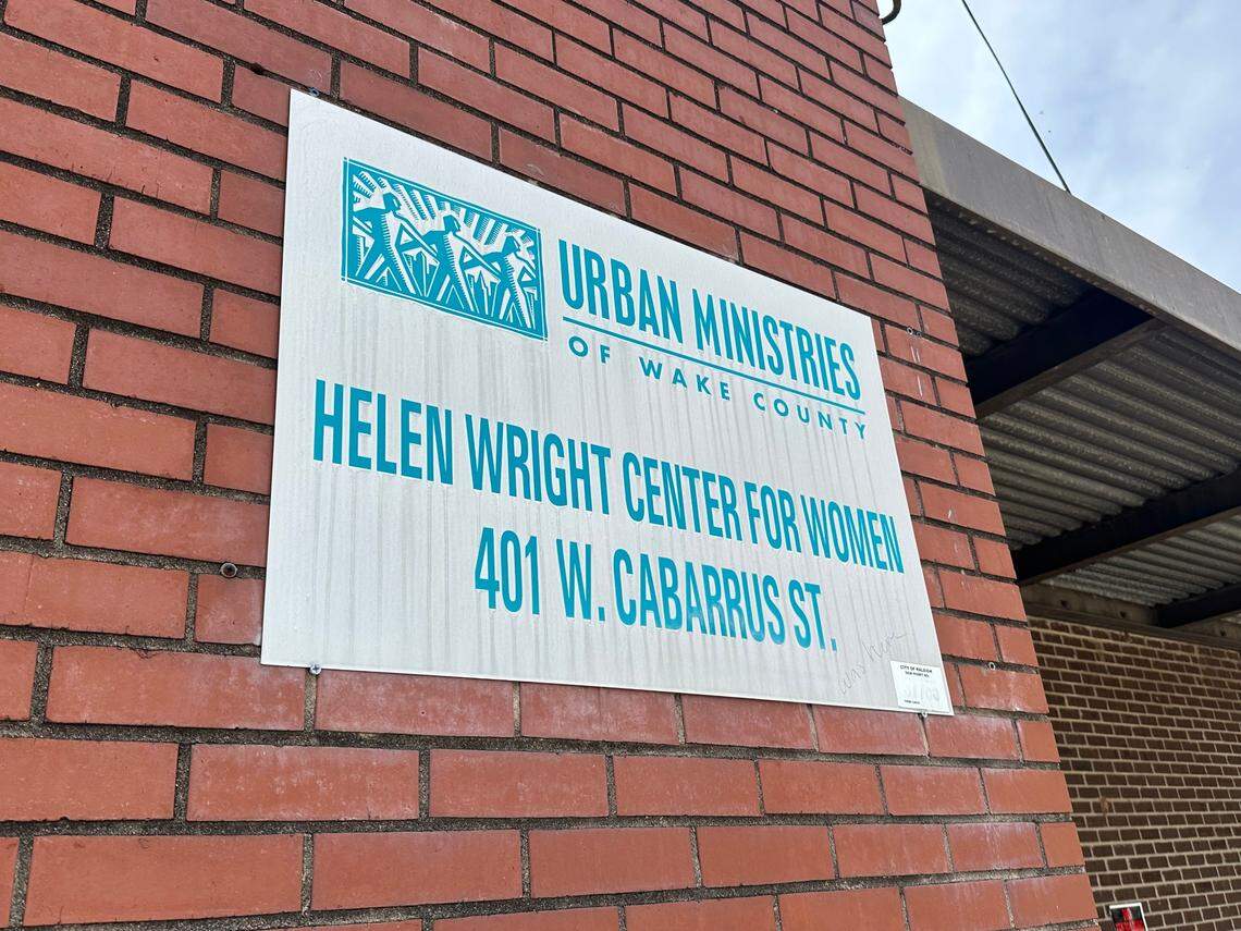 An emergency homeless shelter in downtown Raleigh occupies a building that was once the Helen Wright Center for Women operated by Urban Ministries of Wake County. The Helen Wright Center moved four years ago, but the sign remains on the building, which will be torn down next year.