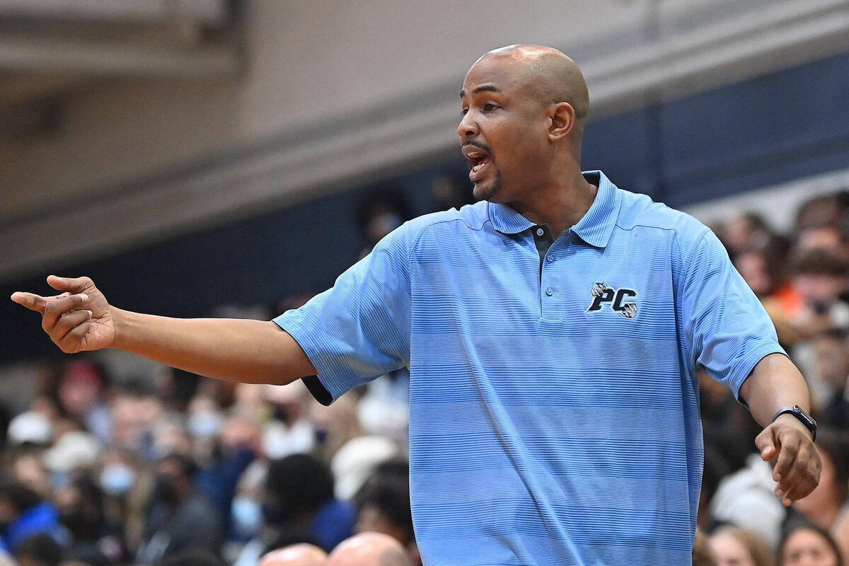 Panther Creek Head Coach Shawan Robinson gives orders to his team in the first half. The Millbrook Wildcats and the Panther Creek Catamounts met in a NCHSAA 4A fourth round game in Raleigh, N.C. on March 1, 2022.