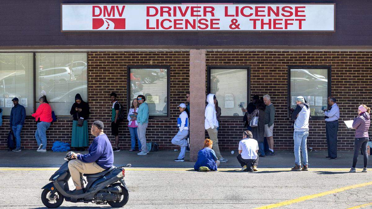 More than 40 people wait in line at the North Carolina DMV Driver’s License Office on Avent Ferry Road on April 10, 2025, in Raleigh  