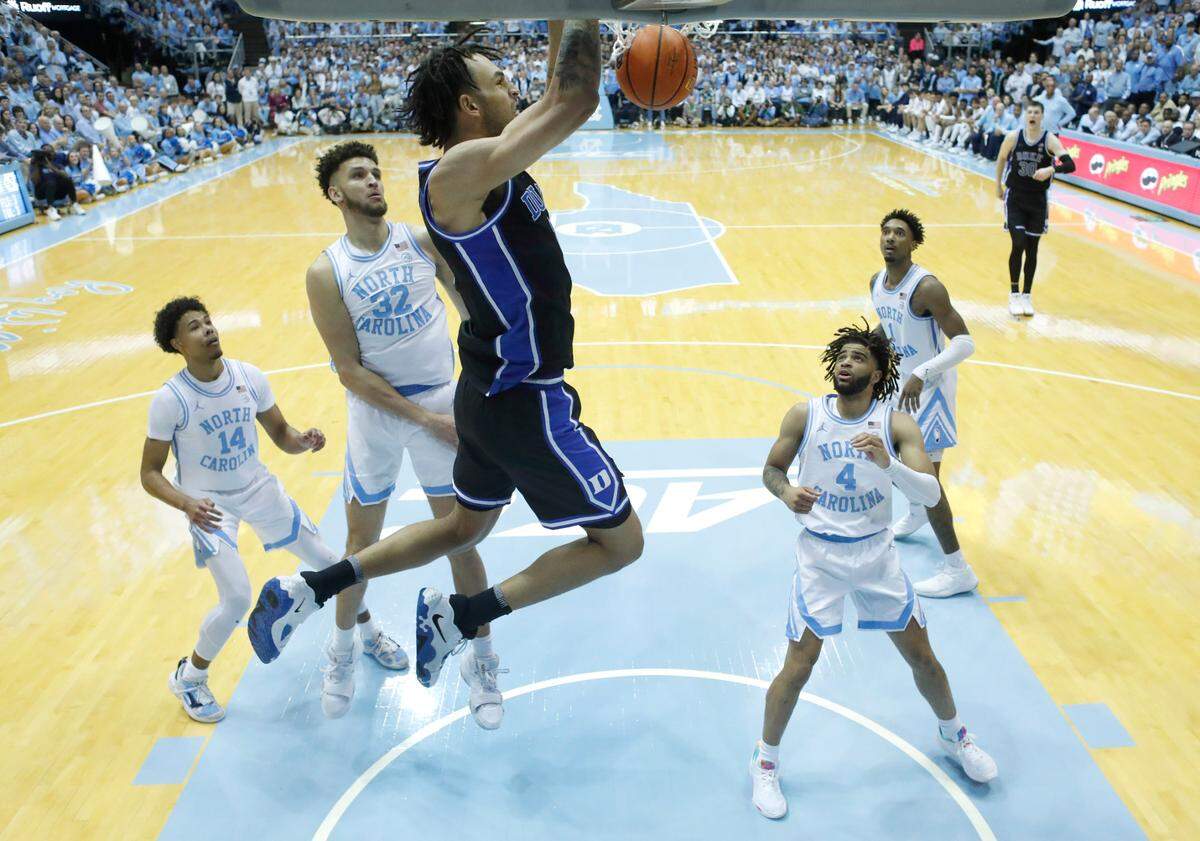 Duke’s Dereck Lively II (1) slams in two during Duke’s 62-57 victory over UNC at the Smith Center in Chapel Hill, N.C., Saturday, March 4, 2023.