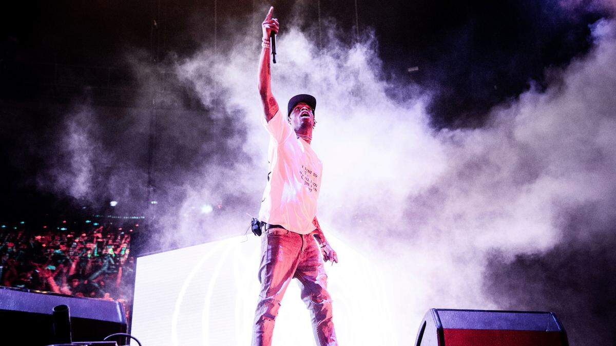 Travis Scott performs at the Voodoo Music Experience in City Park on Saturday, Oct. 27, 2018, in New Orleans. He performed in Raleigh Nov. 9, 2018.