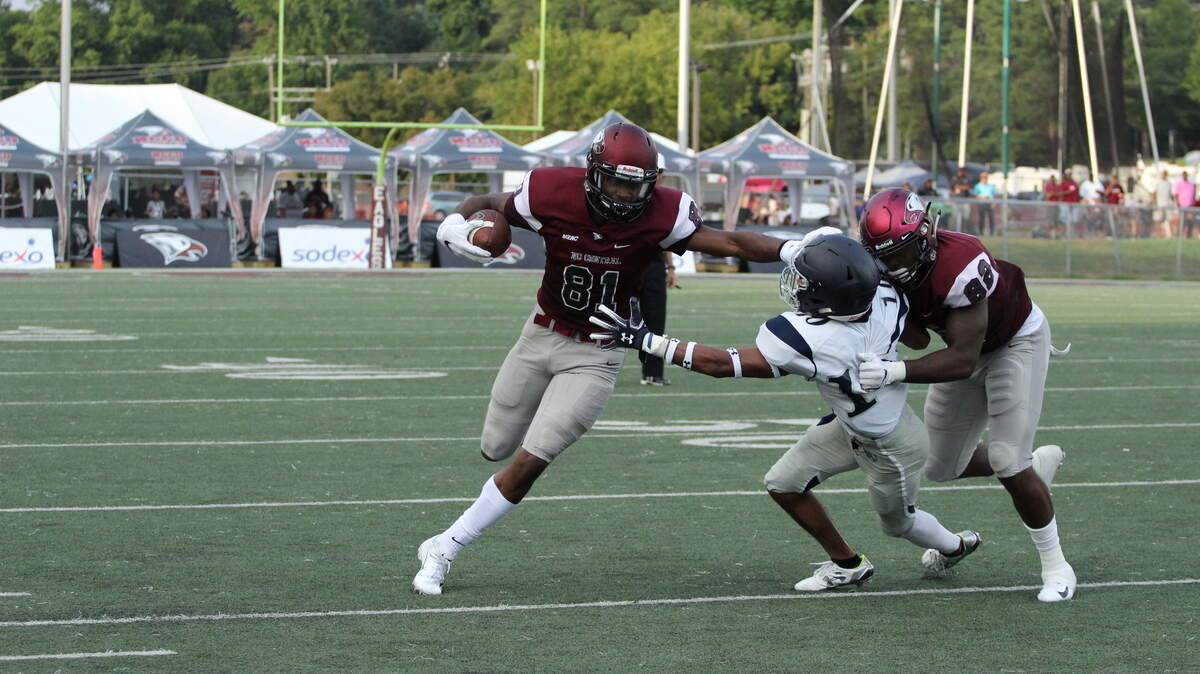 North Carolina Central freshman wide receiver Tyler Barnes picks up yards after the catch during the first half versus Saint Augustine’s.