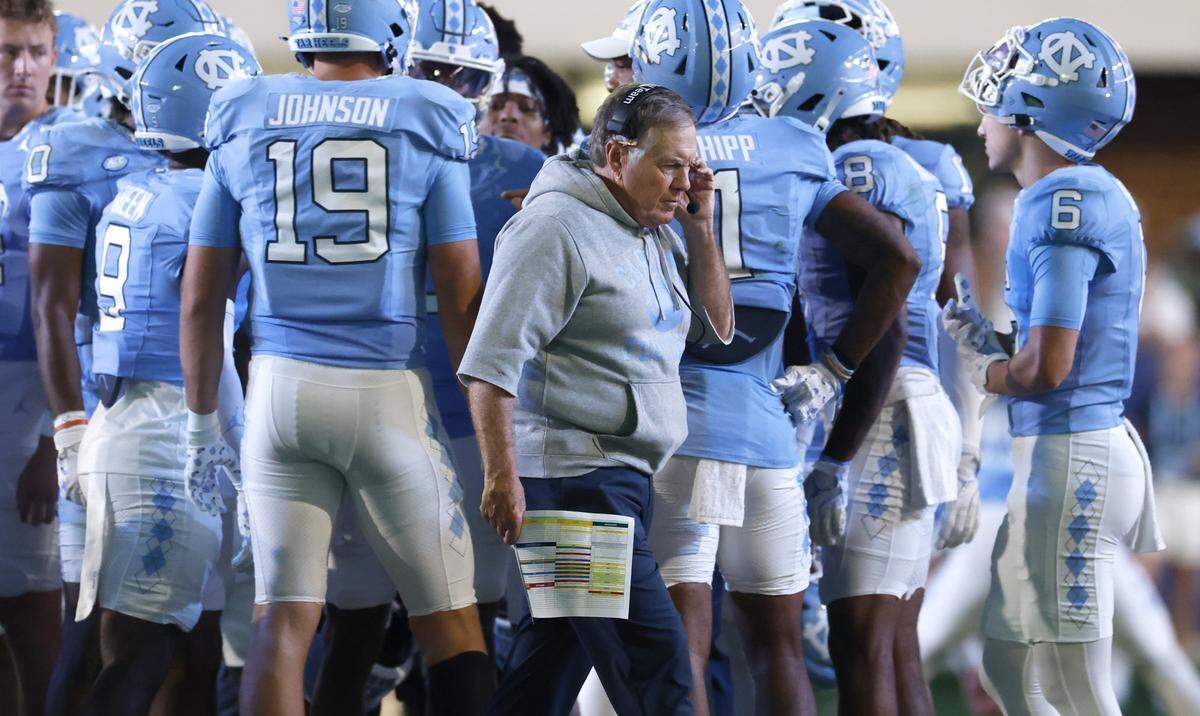 North Carolina head coach Bill Belichick walks back to the sideline after huddling with the team during the first half of UNC’s game against TCU at Kenan Stadium in Chapel Hill, N.C., Monday, Sept. 1, 2025.