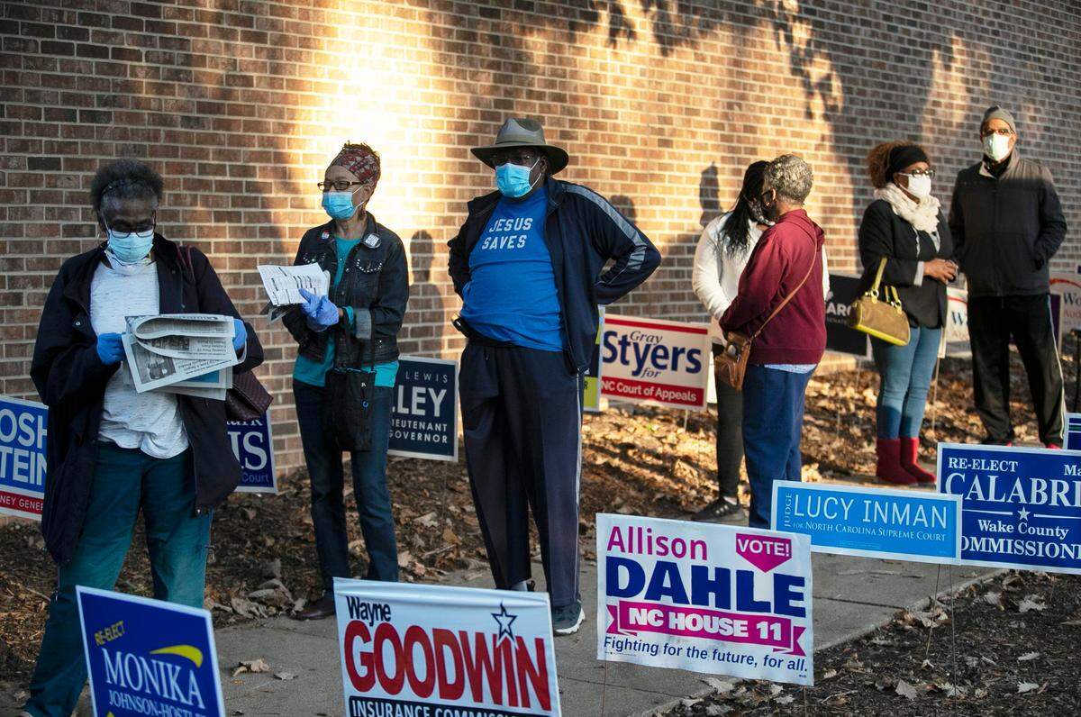 More than 350 people were in line to vote when the poll opened at 8 a.m., the first arriving was at 4:45 a.mm on Thursday, October 15, 2020 at Roberts Park in Raleigh, N.C. This was the first day of early voting in North Carolina.