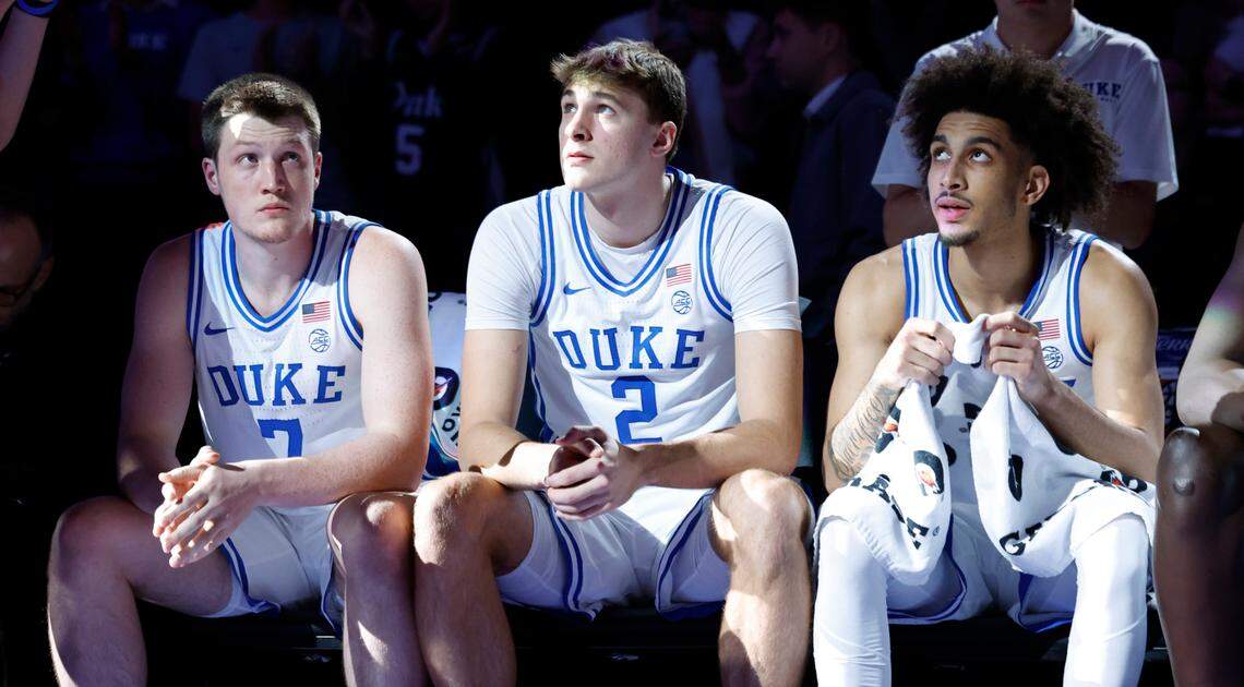 Duke’s Kon Knueppel (7), Cooper Flagg (2) and Tyrese Proctor (5) wait to be introduced before Duke’s game against Kansas in the Vegas Showdown at T-Mobile Arena in Las Vegas, Nev., Tuesday, Nov. 26, 2024.