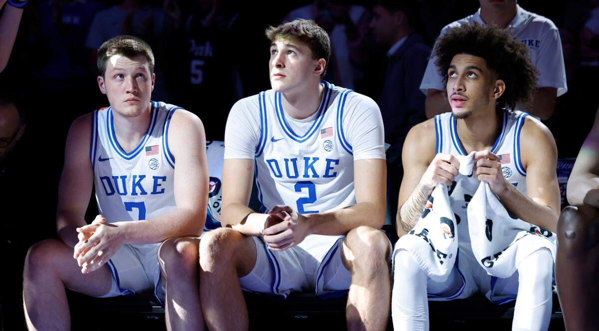 Duke’s Kon Knueppel (7), Cooper Flagg (2) and Tyrese Proctor (5) wait to be introduced before Duke’s game against Kansas in the Vegas Showdown at T-Mobile Arena in Las Vegas, Nev., Tuesday, Nov. 26, 2024.