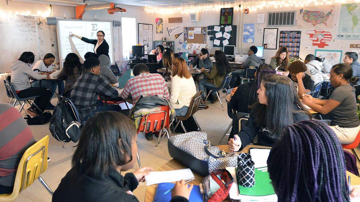 Students listen to social studies teacher Ashley Austin during class at Olympic High School in Charlotte, N.C., on April 8, 2016.