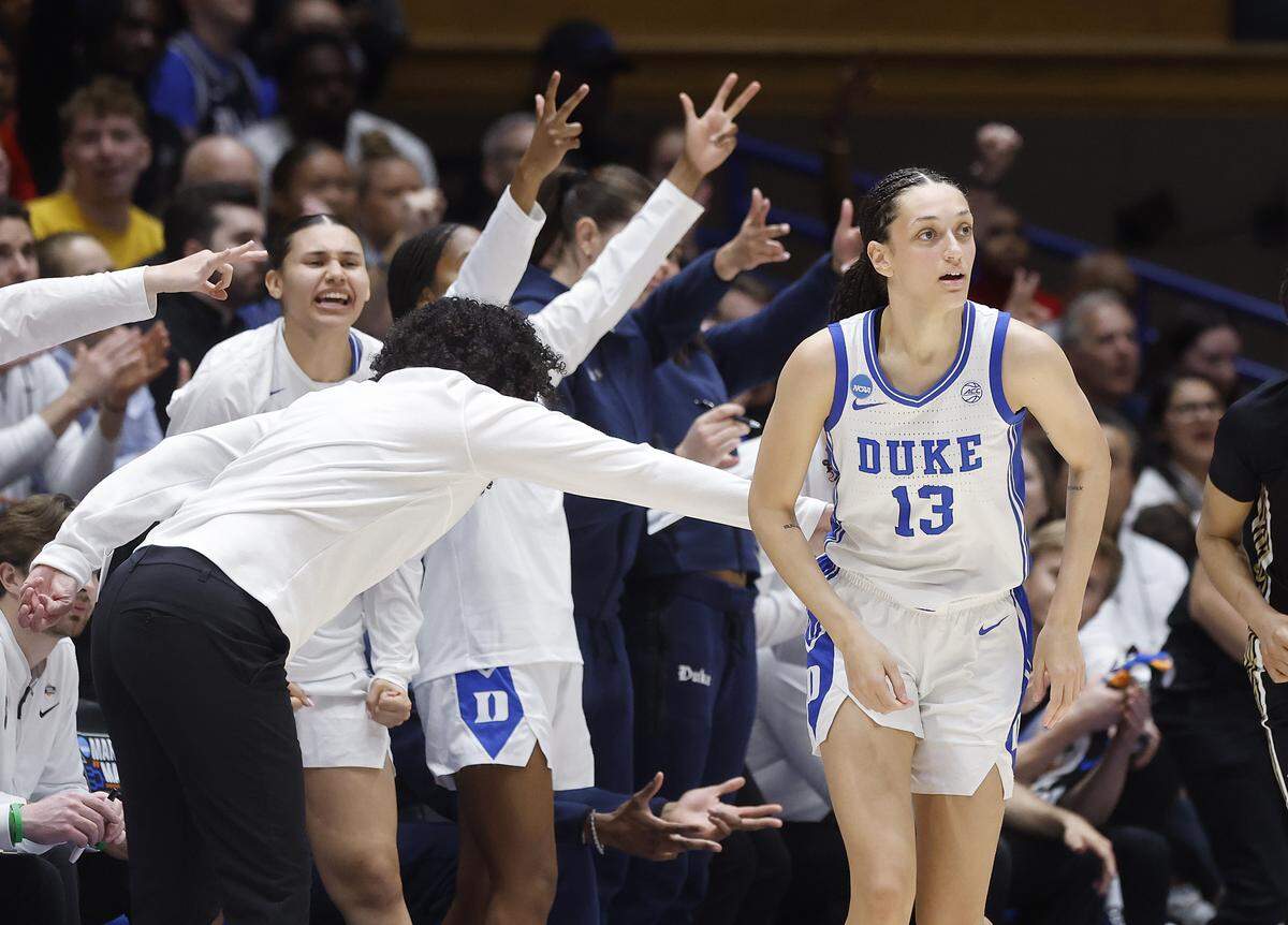 Duke head coach Kara Lawson reacts after Jordan Wood knocked down a three-point basket during the second half of the Blue Devils’ 81-64 first-round NCAA Tournament win over College of Charleston on Friday, March 20, 2026, at Cameron Indoor Stadium in Durham, N.C.