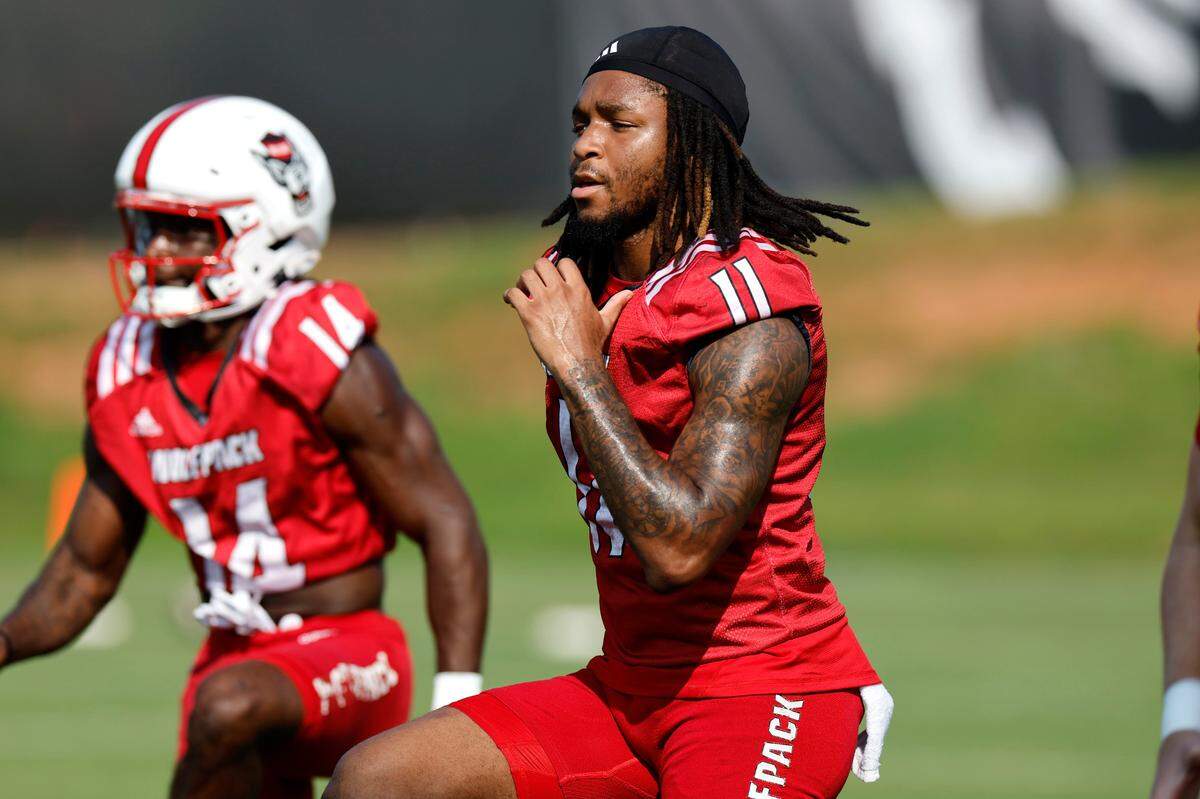 N.C. State tight end Juice Vereen (11) warms up  during the Wolfpack’s first practice in Raleigh, N.C., Wednesday, July 31, 2024.
