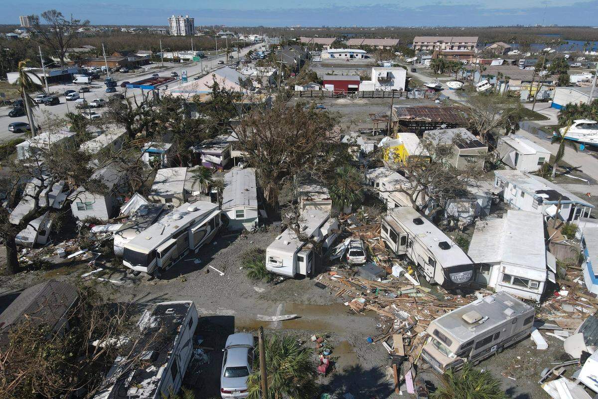 Damaged mobile homes lie scattered after the passage of Hurricane Ian, in the San Carlos area of Fort Myers Beach, Fla., Thursday, Sept. 29, 2022.