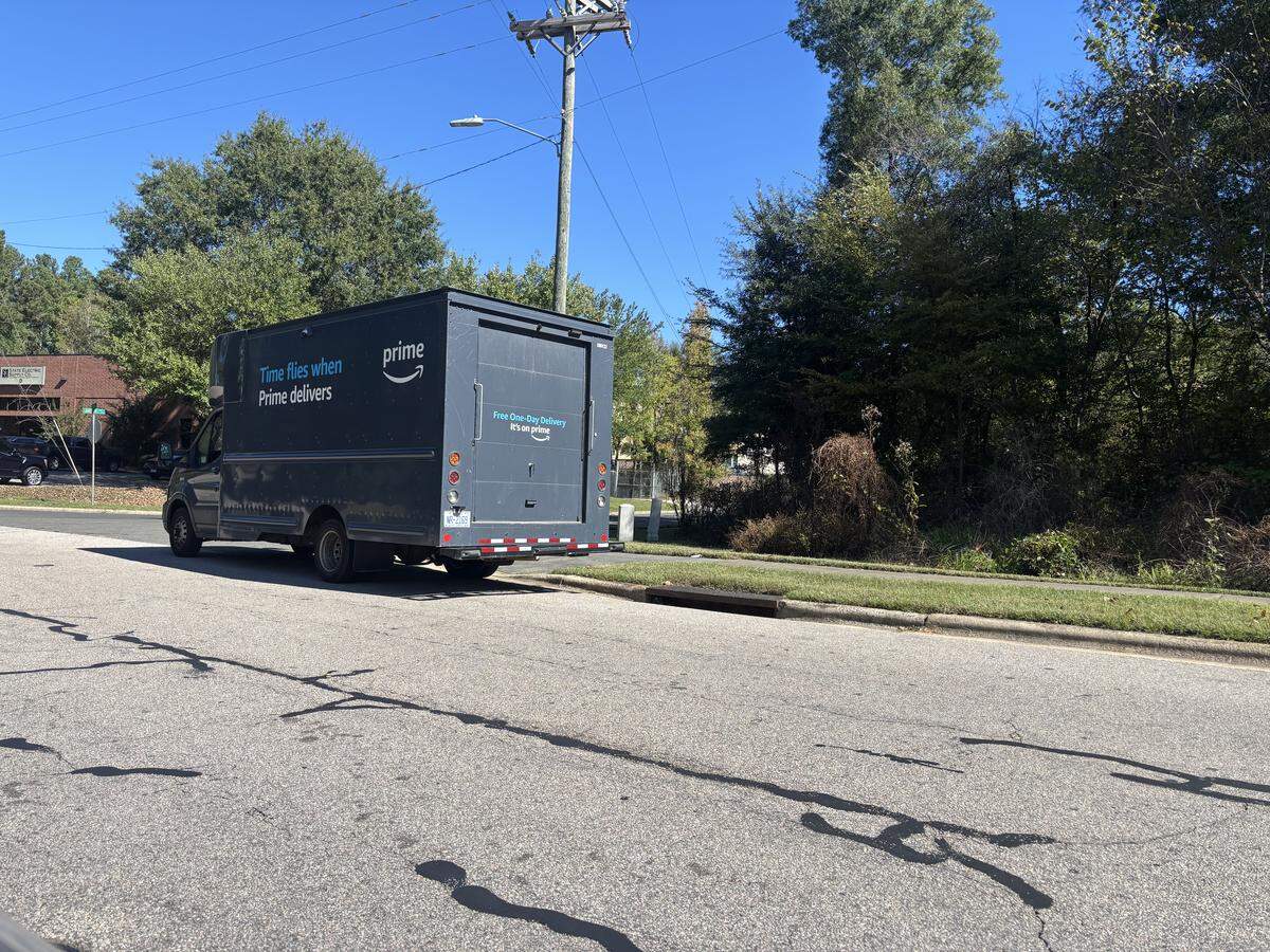 An Amazon delivery truck drives away from the DRT8 delivery station in Durham, N.C. on Oct. 9, 2025.