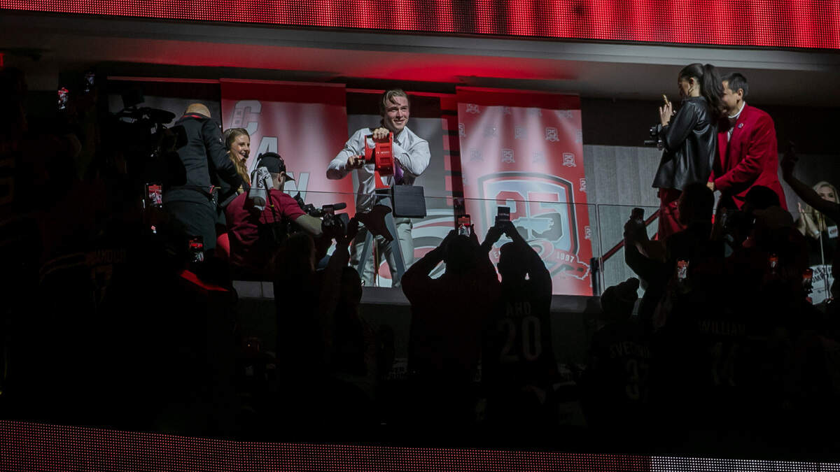 Carolina Hurricanes’ Andrei Svechnikov, out with an injury, sounds the warning siren as his teammates take the ice for their game against the New York Islanders in game one of their first round Stanley Cup series on Tuesday, April 17, 2023 at PNC Arena in Raleigh, N.C.