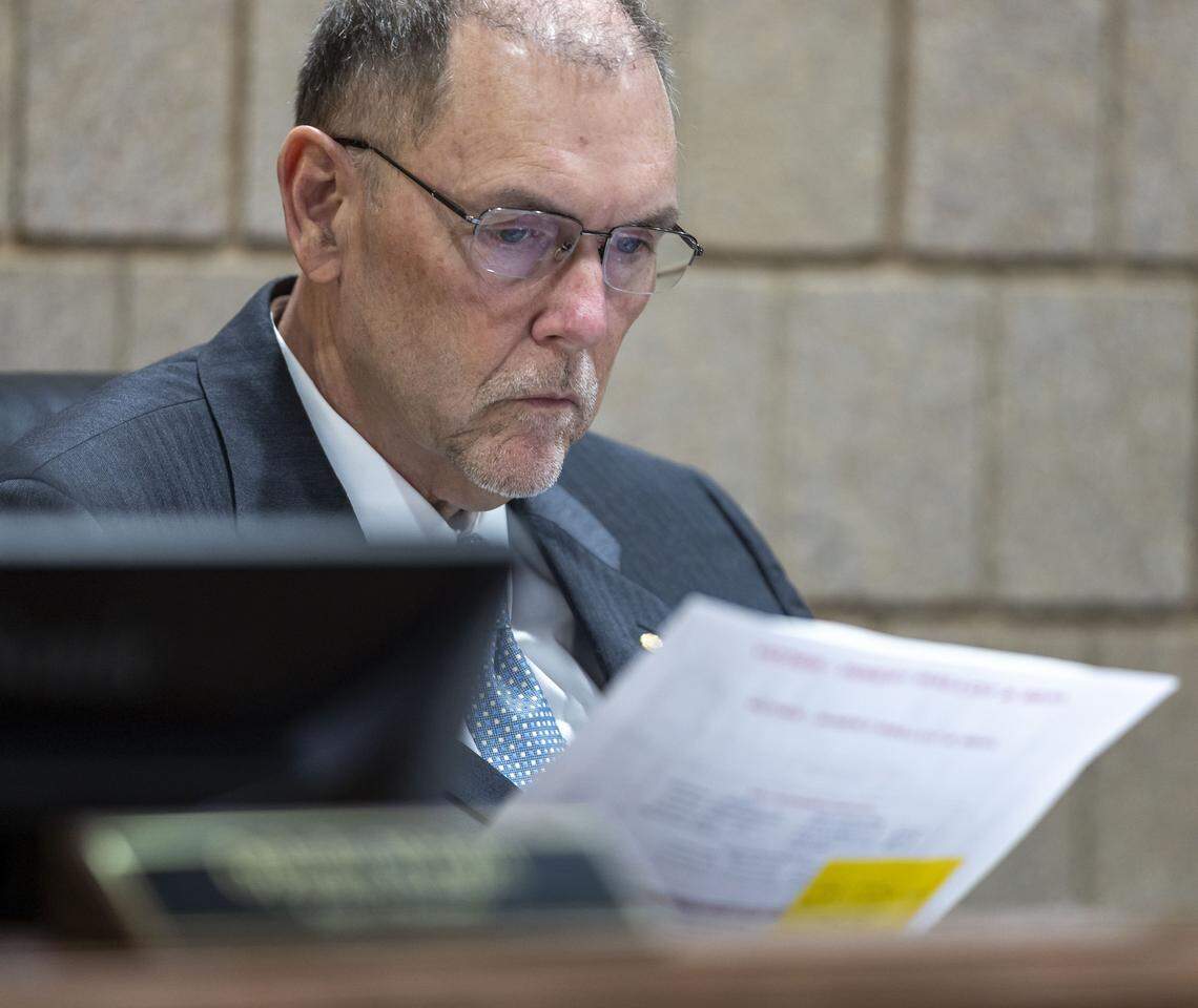 Rockingham County Board of Elections member Bert Jones inspects provisional ballots in the race between North Carolina Senate President Pro Tempore Phil Berger and his challenger, Rockingham County Sheriff Sam Page, on Friday, March 6, 2026 in Reidsville, N.