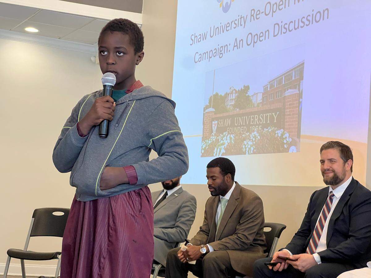 Hanza Mussa, 10, reciting a prayer at the Islamic Center of Morrisville on March 5, ahead of a meeting to discuss the ongoing closure of the mosque on Shaw University’s campus.