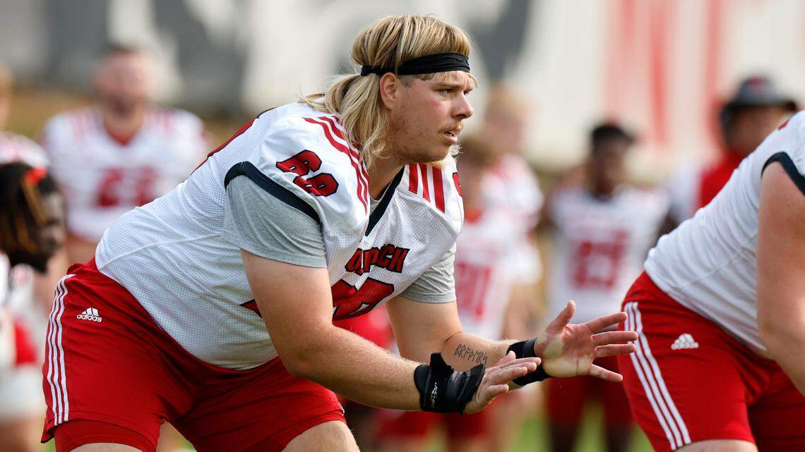 N.C. State offensive lineman Dawson Jaramillo (69) runs a drill during the Wolfpack’s first fall practice in Raleigh, N.C., Wednesday, August 2, 2023.