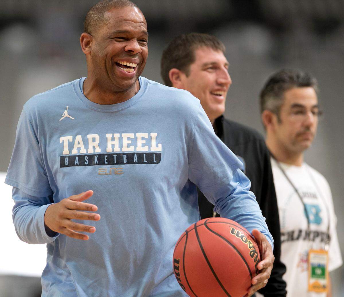 North Carolina assistant coach Hubert Davis laughs with the players during the Tar Heels‚Äô practice on Friday, March 31, 2017 at the University of Phoenix Stadium in Glendale, Arizona.