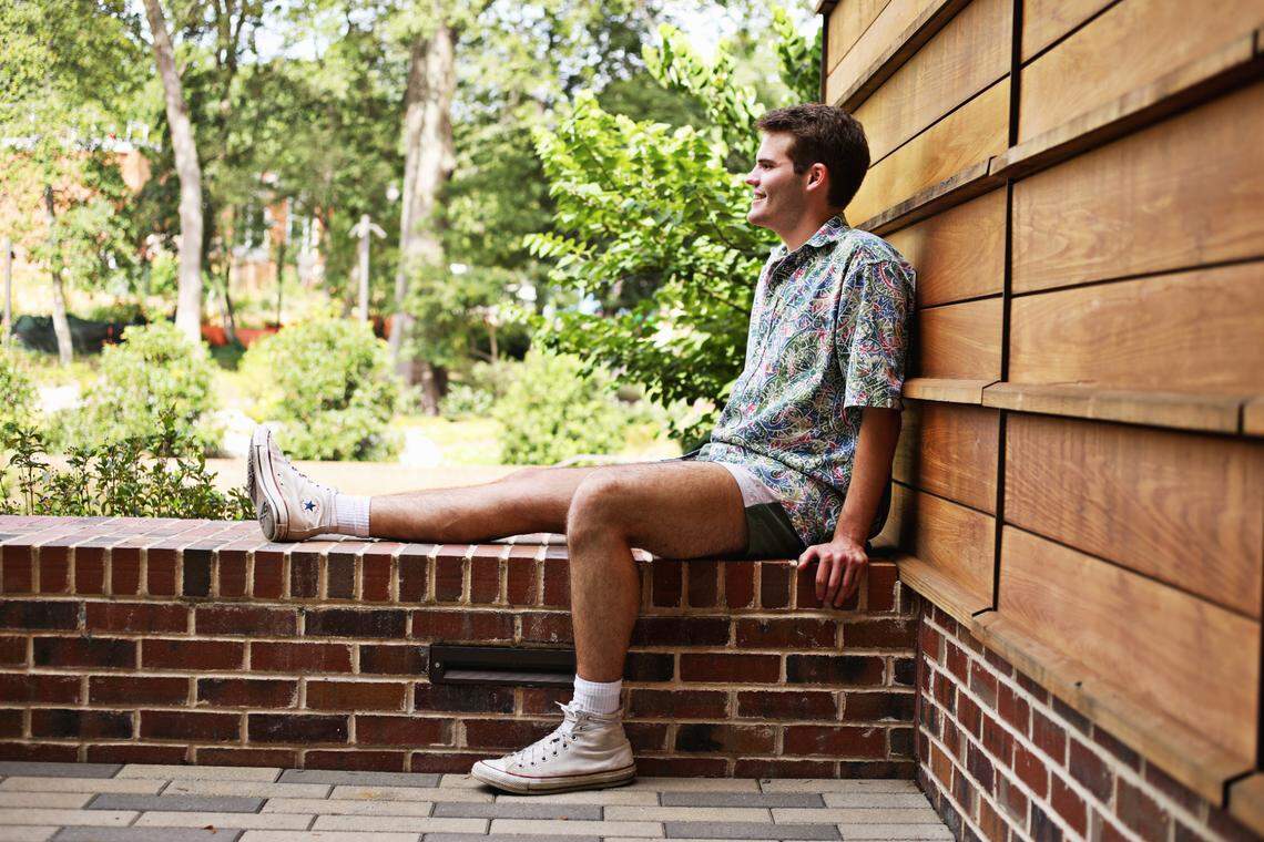 N.C. State University student Zachary Winstead, 20, likes to escape to the patio of the Gregg Museum for lunch and breaks from his apartment. Winstead, a political science major, hopes to move back home to Wilson to continue online classes.