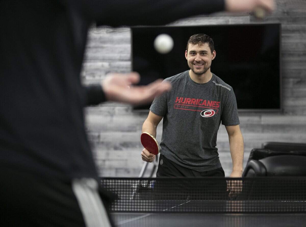 Carolina Hurricanes’ Nino Niederreiter (21) starts a friendly game of ping pong in the Hurricanes’ locker room following their practice on Tuesday, April 30, 2019 at the PNC Arena in Raleigh, N.C.