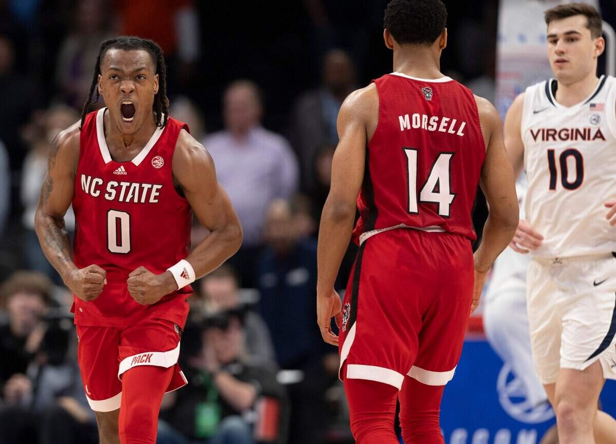 N.C. State’s D.J. Horne (0) reacts after sinking two free throws with ten seconds to play, to secure the Wolfpack’s 73-65 overtime victory over Virginia in the semi-finals of the ACC Men’s Basketball Tournament at Capitol One Arena on Friday, March 15, 2024 in Washington, D.C.